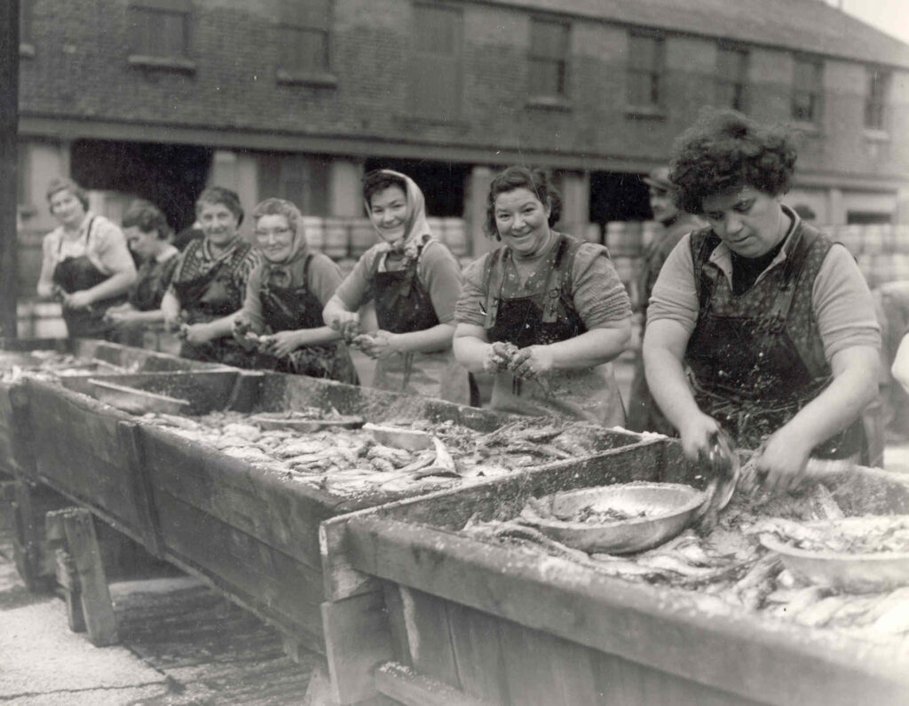 Scots Girls gutting herring